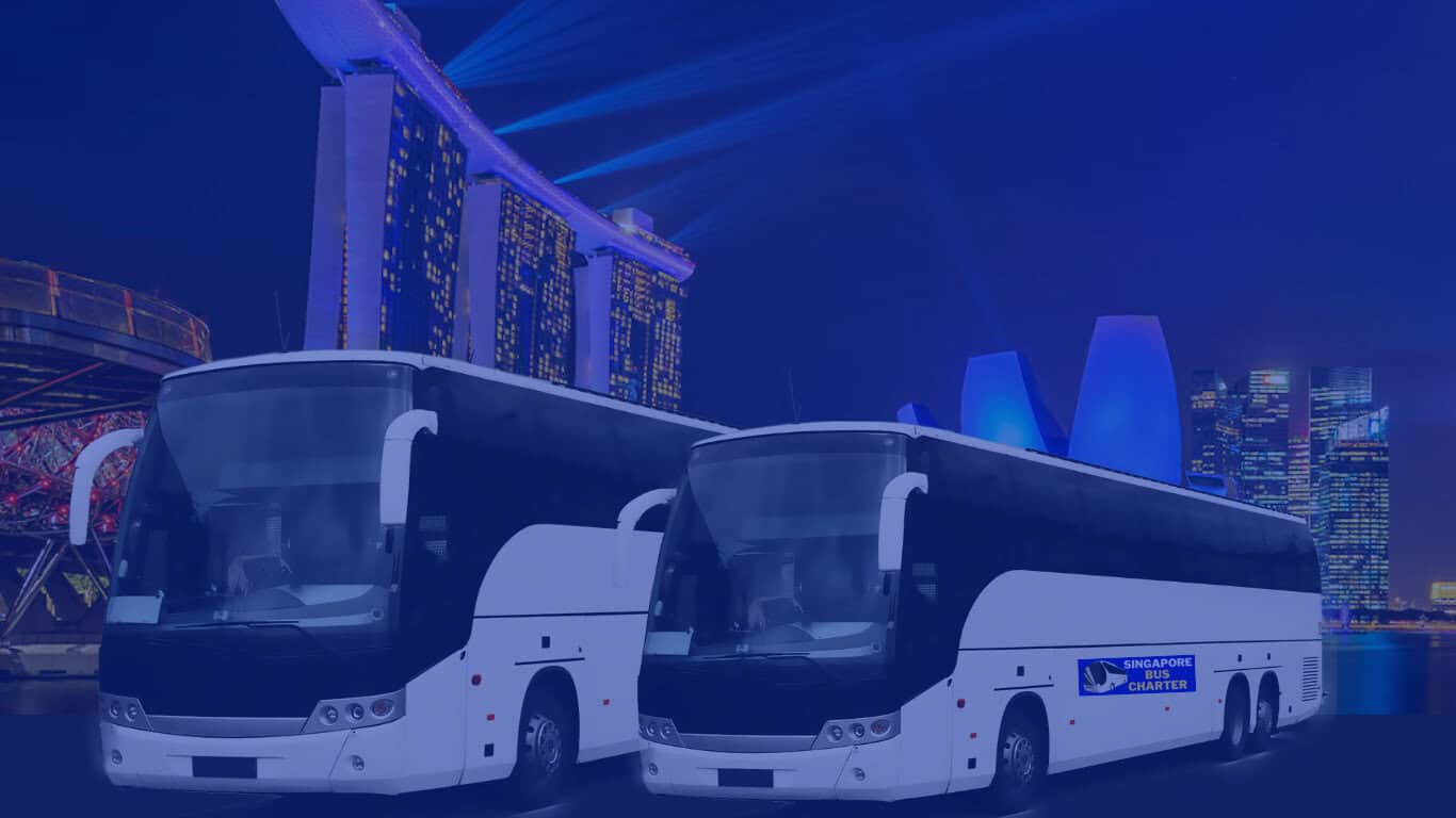 private charter coach parked by a singapore roadside ready to pick up a group